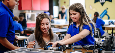 Students building robots